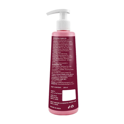 Pink bottle with a pump on a white background