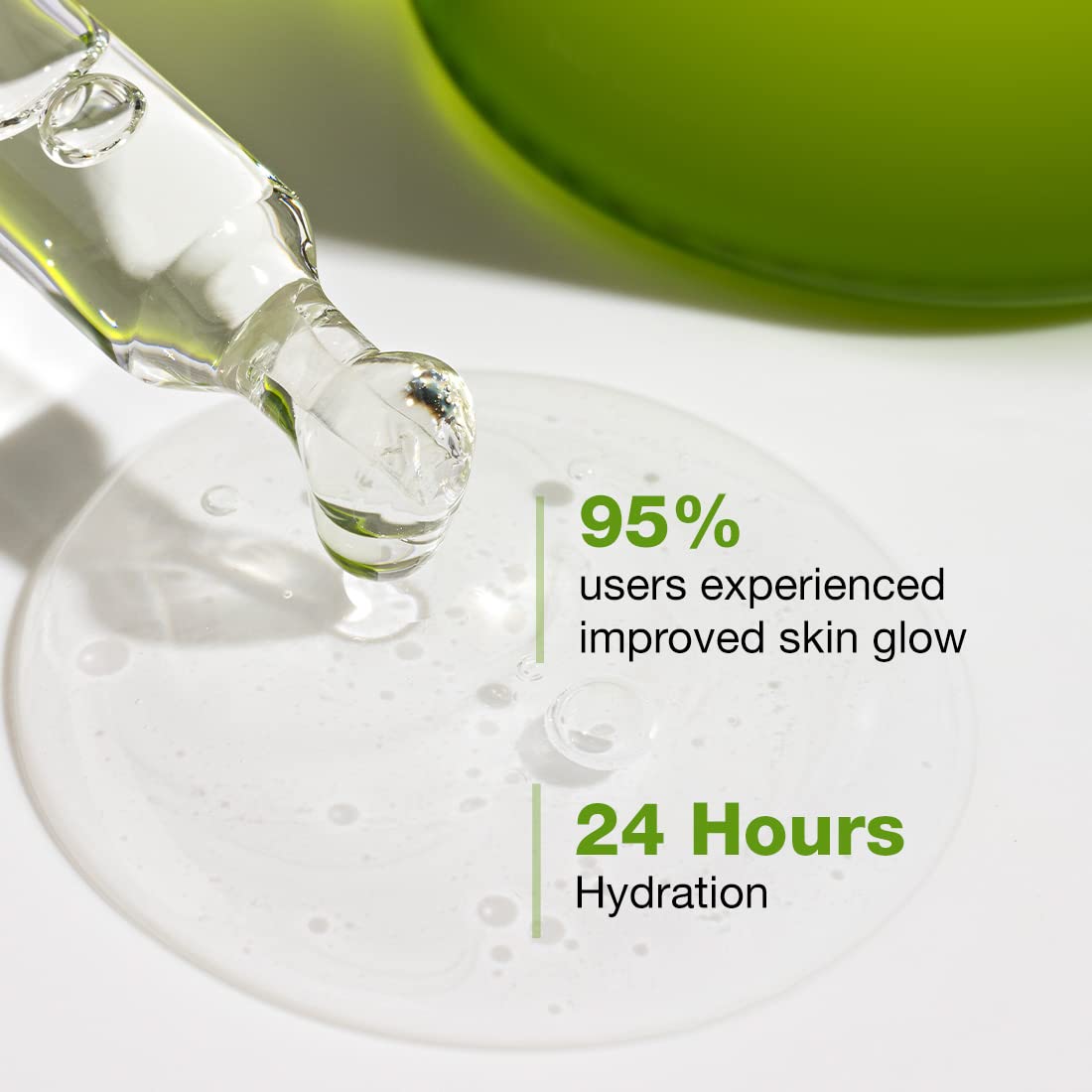 Glass dropper with liquid being dispensed, green bowl in background, text about skin glow and hydration.