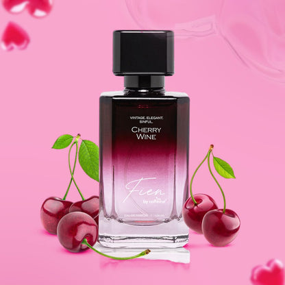 Perfume bottle labeled 'Cherry Wine' with cherries on a pink background