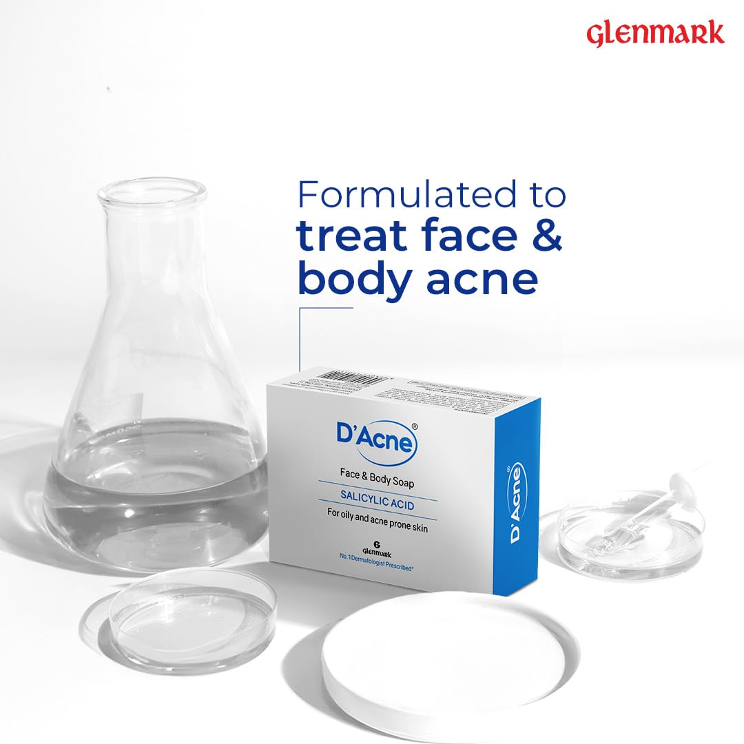 D'Acne face and body soap packaging with a beaker and soap bars on a white background, featuring the Glenmark brand.