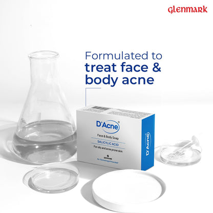 D'Acne face and body soap packaging with a beaker and soap bars on a white background, featuring the Glenmark brand.