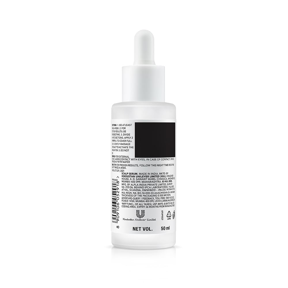 Skincare serum bottle with dropper on a white background