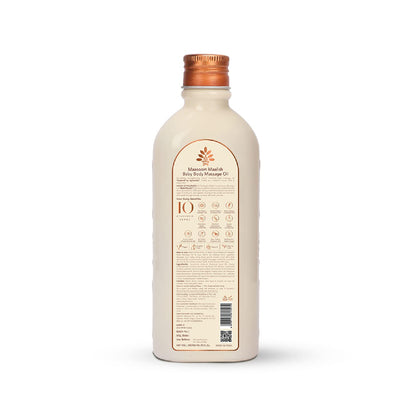 Bottle of massage oil with a copper cap on a white background