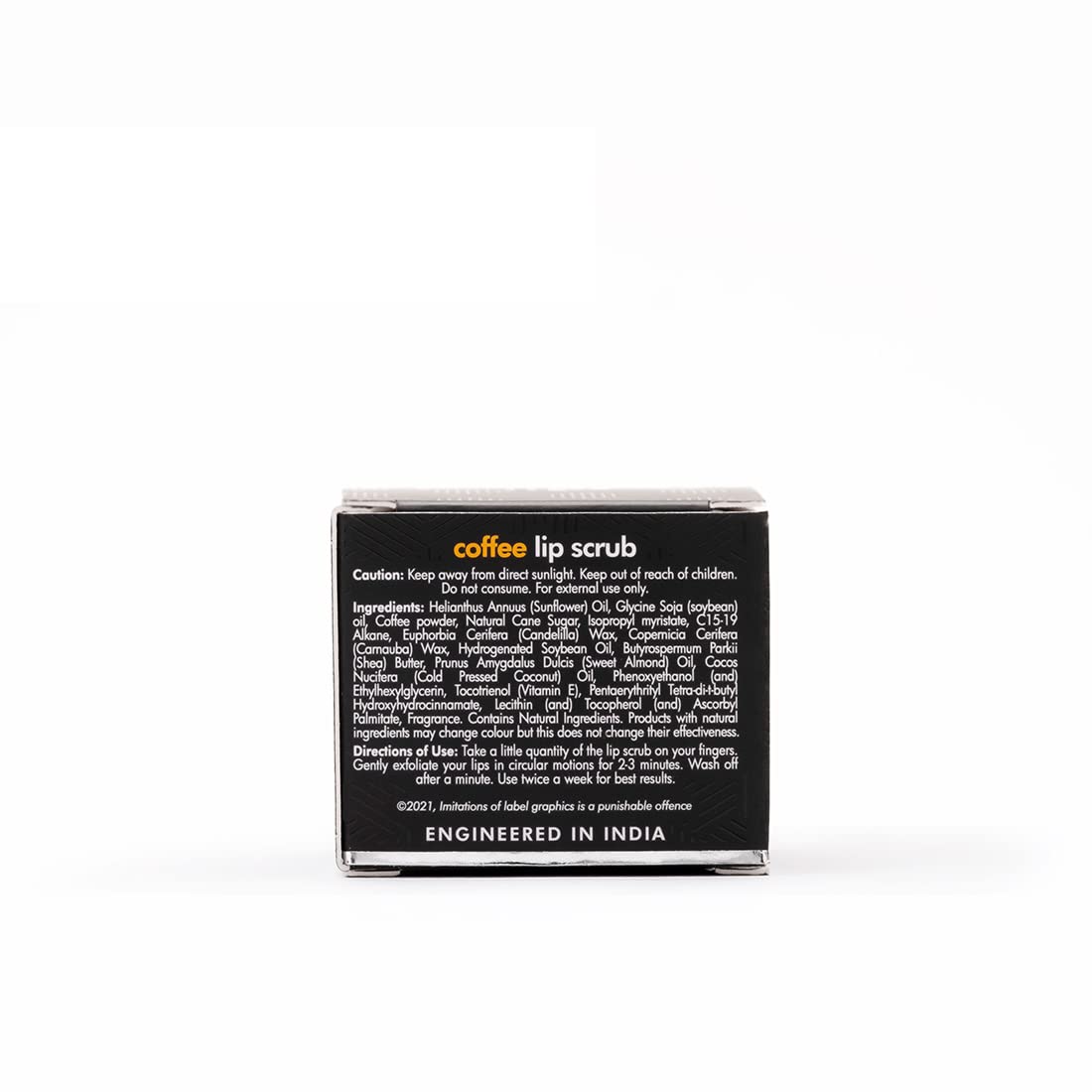 Black lip scrub packaging with text on a white background
