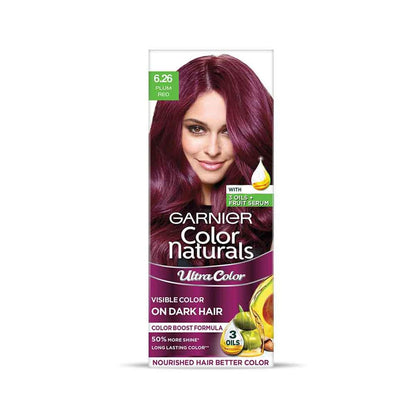 Garnier Color Naturals hair color packaging with a model featuring dark purple hair on a white background.