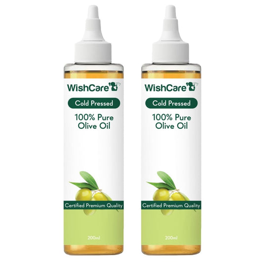 Two bottles of WishCare 100% Pure Olive Oil on a white background