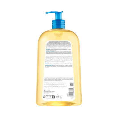 Yellow bottle with blue pump on a white background