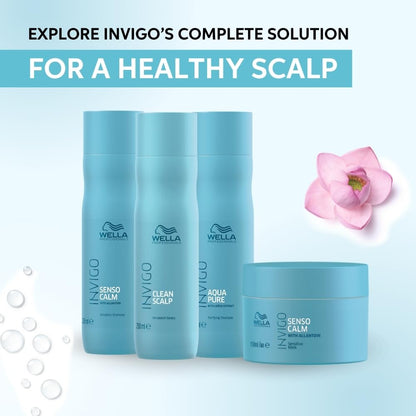 Wella Invigo scalp care products with a pink flower on a light blue background