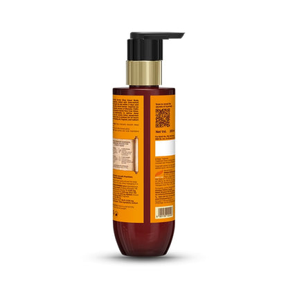 Bottle with pump and orange label on a white background