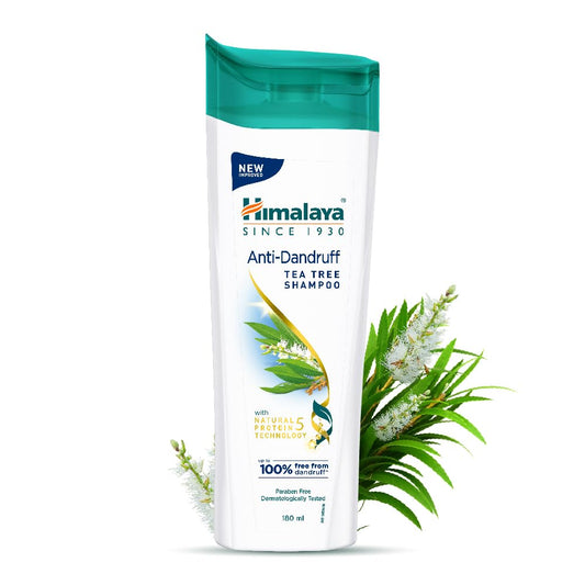Himalaya Anti-Dandruff Tea Tree Shampoo bottle with green cap and plant imagery on a white background