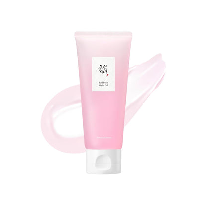 Pink skincare product tube with a white label on a white background
