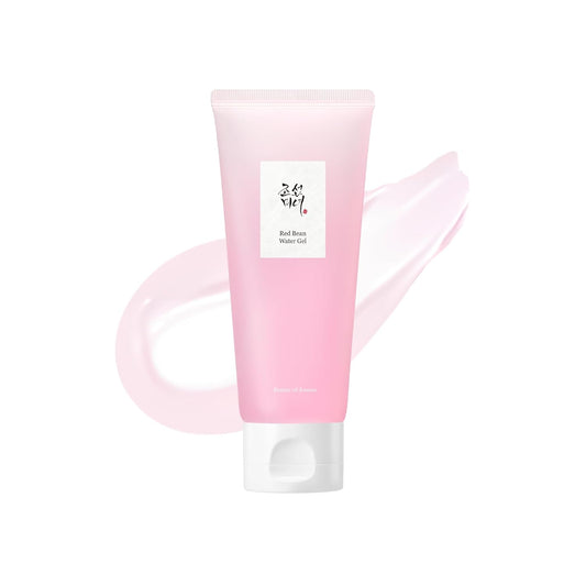 Pink skincare product tube with a white label on a white background