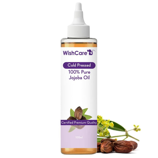 WishCare 100% Pure Jojoba Oil bottle with jojoba seeds and leaves on a white background