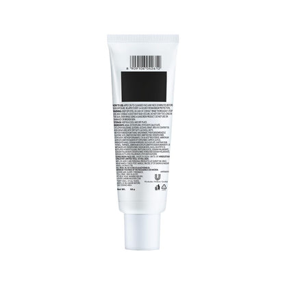 White tube with black label on a white background