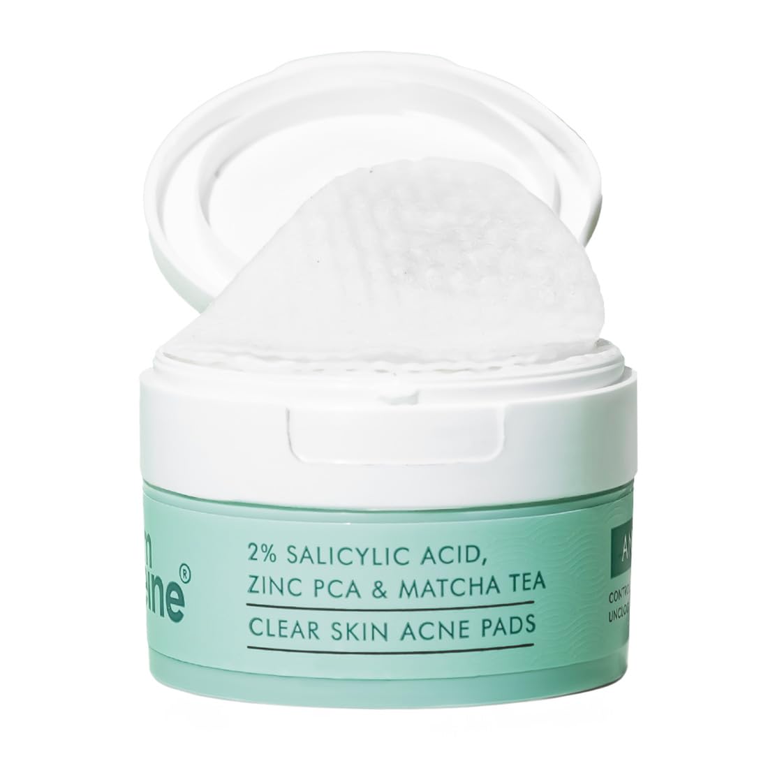 Jar of clear skin acne pads with green label on a white background