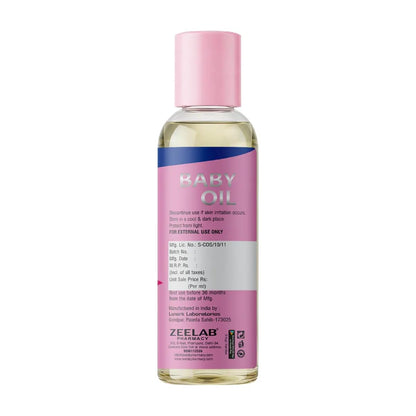 Bottle of Kaky Oil with pink cap and label on a white background