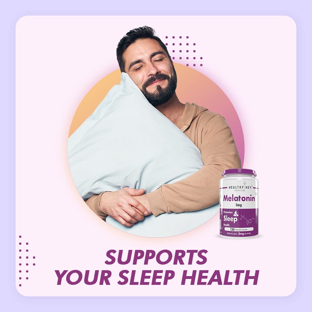 Man wrapped in a blanket with a bottle of melatonin on a purple background