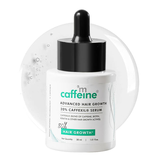 Caffeine advanced hair growth serum bottle with dropper on a white background