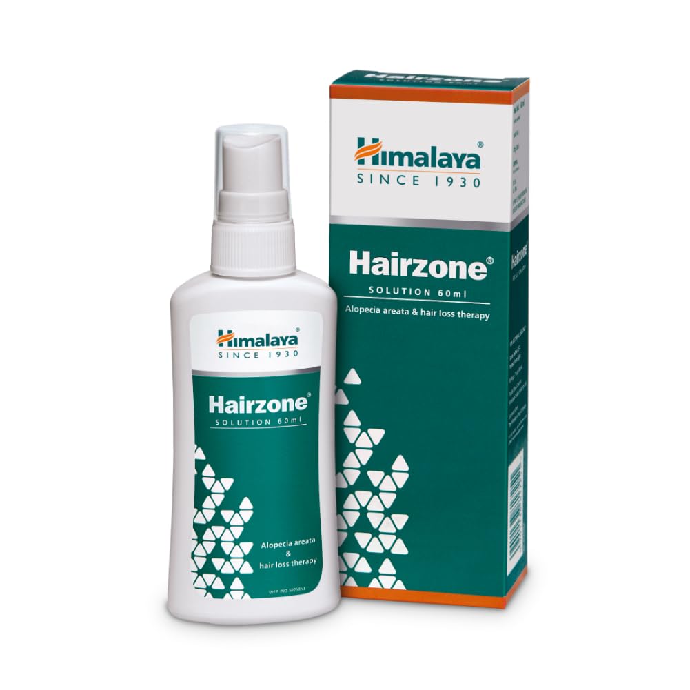 Himalaya Hairzone solution bottle and box on a white background