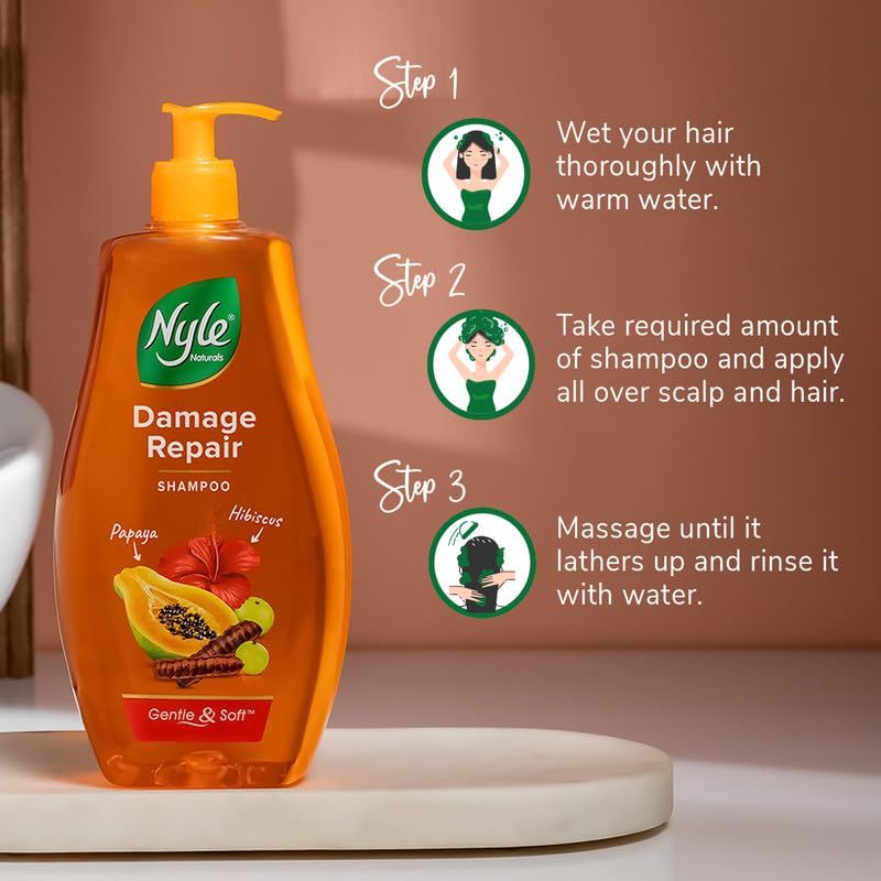 Nyle Damage Repair Shampoo bottle with usage instructions on a beige background