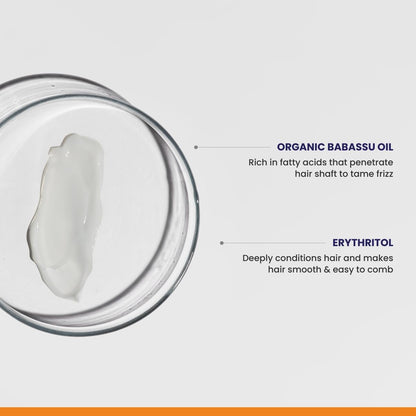 Jar of organic babassu oil with text on a gray background