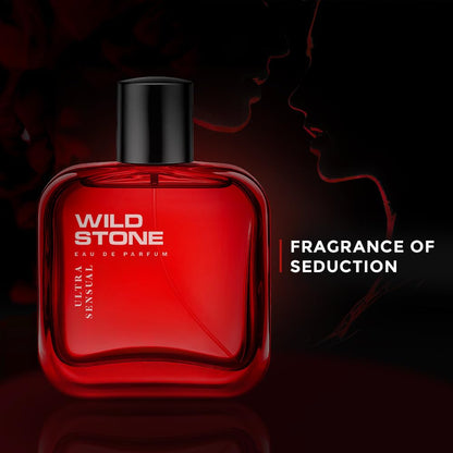 Red Wild Stone perfume bottle with black cap on a dark background