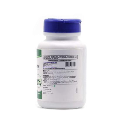 White supplement bottle with a blue cap on a white background