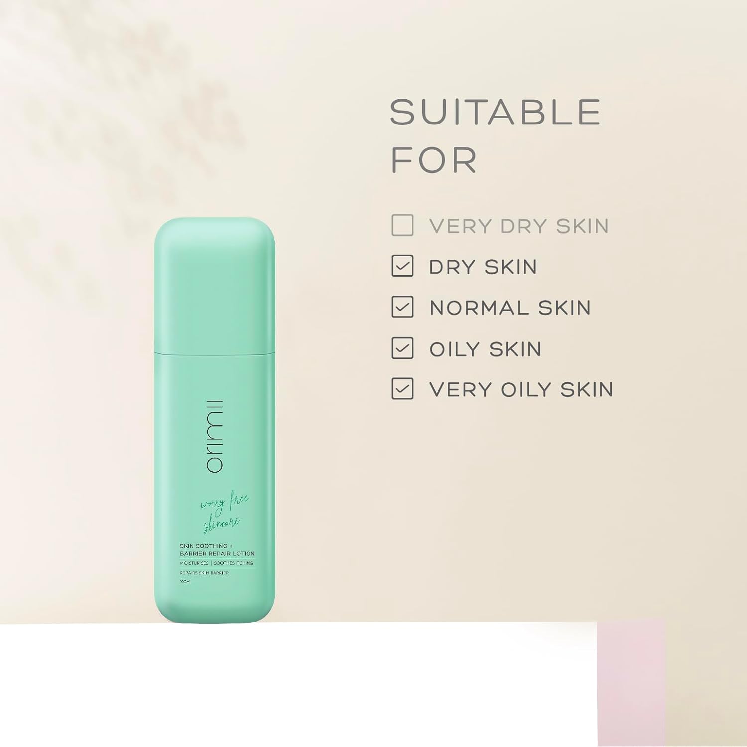 Mint green bottle with text indicating skin types suitable for use.