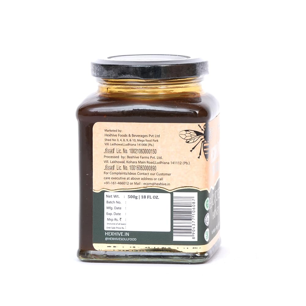 Jar of honey with a label on a white background