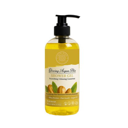 Bottle of Glowing Argan Bliss shower gel with pump on a white background