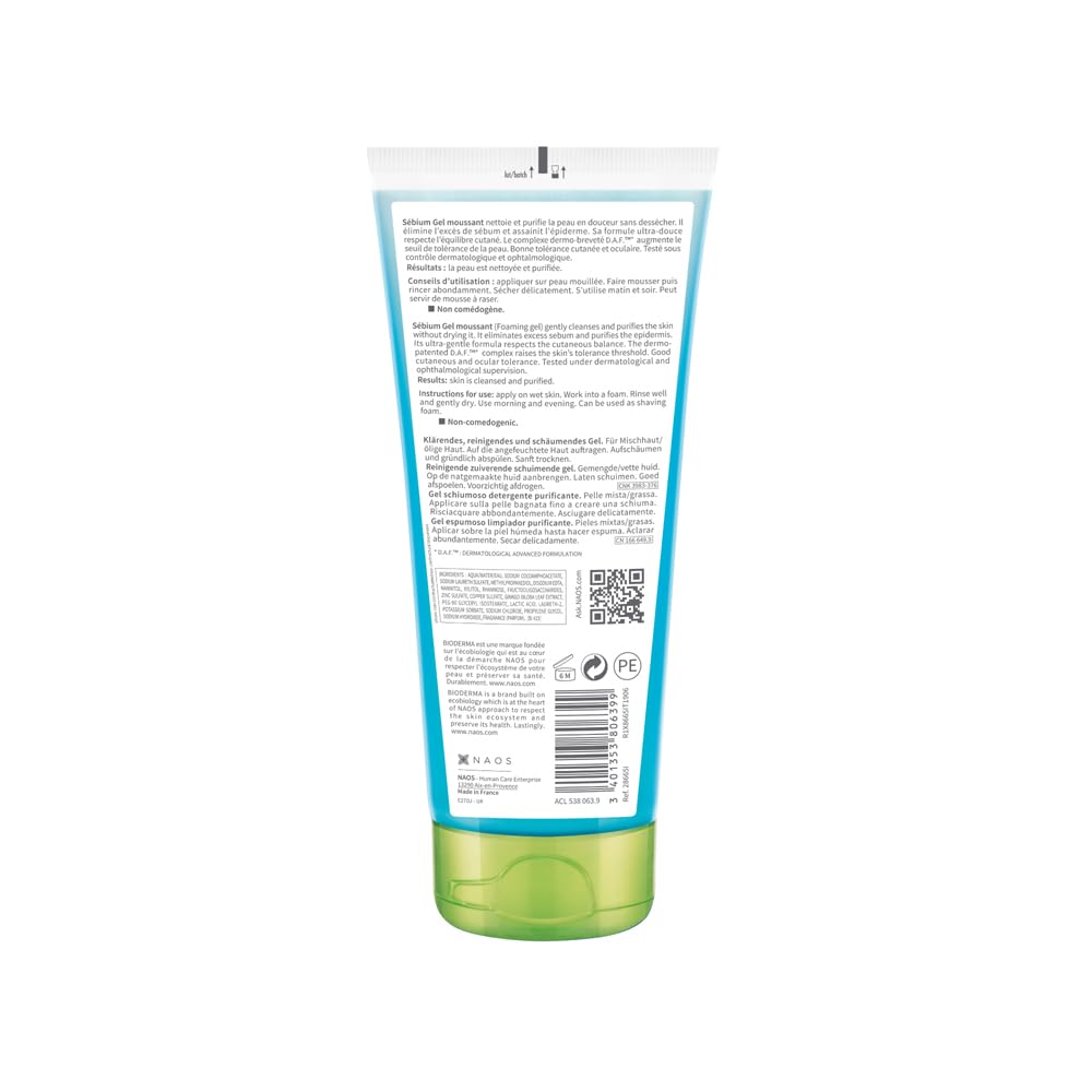 Back view of a green and blue tube with text and a QR code on a white background