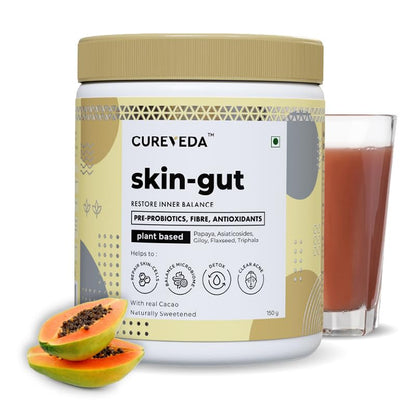 Cureveda skin-gut product with a glass of juice and papaya on a white background