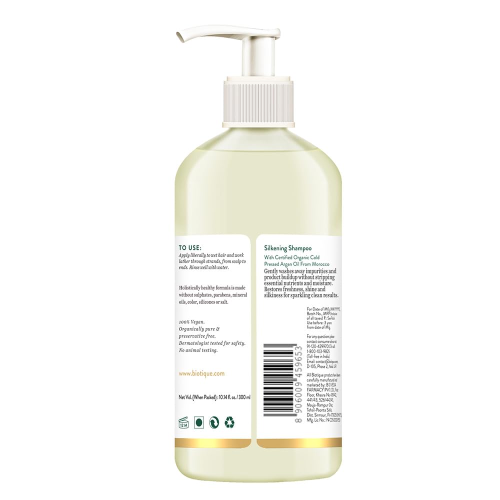 Shampoo bottle with pump and label on a white background