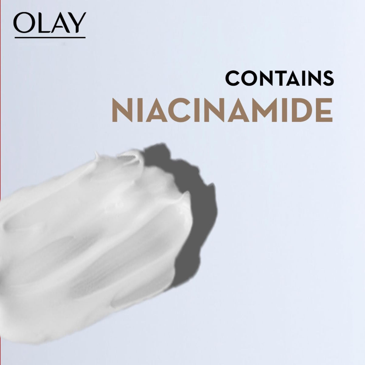 Olay product with Niacinamide text on a light gray background