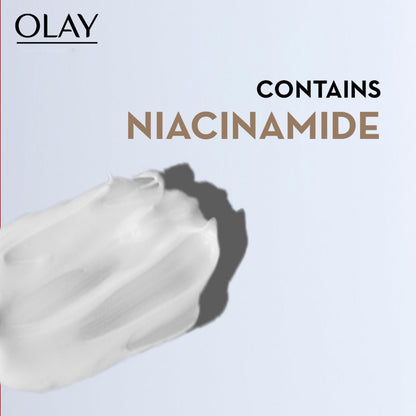 Olay product with Niacinamide text on a light gray background