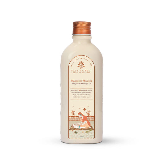 Baby body massage oil bottle with a decorative label on a white background