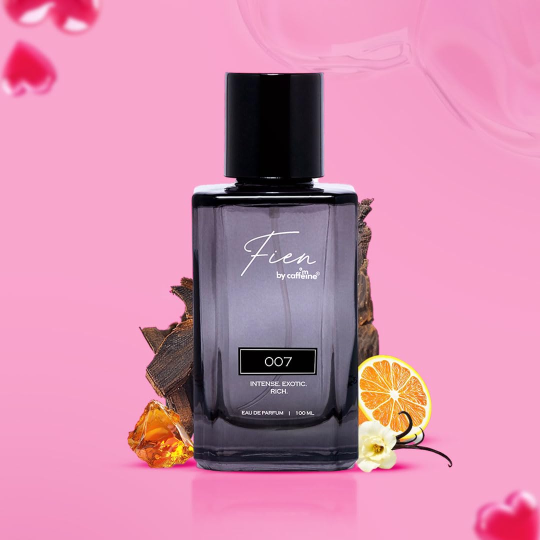 Perfume bottle labeled 'Fien' on a pink background with floral elements