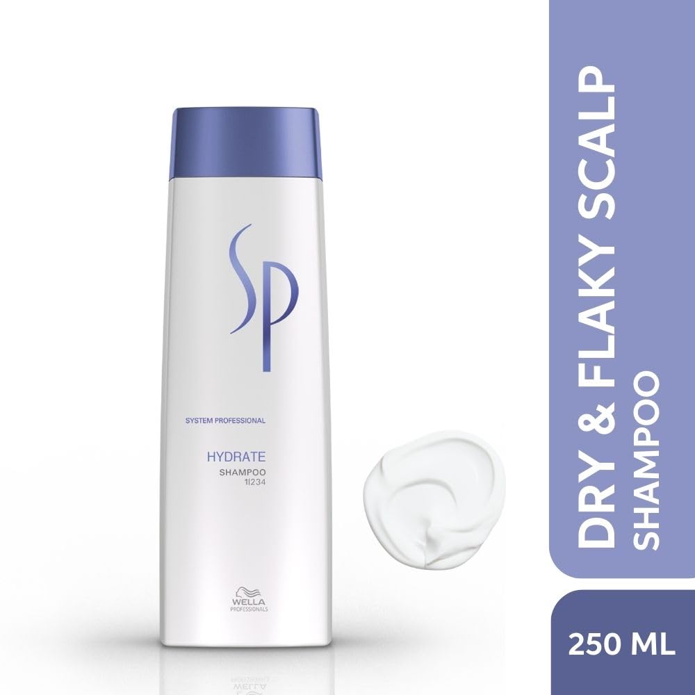 Wella SP Hydrate Shampoo bottle with a small amount of shampoo on a white background