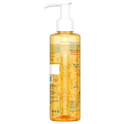 Orange bottle with pump on a white background