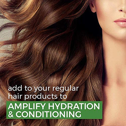Close-up of a woman's face with wavy brown hair, promoting hair product amplification.