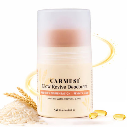 Carmesi Glow Revive Deodorant with rice grains and oil droplets on a white background