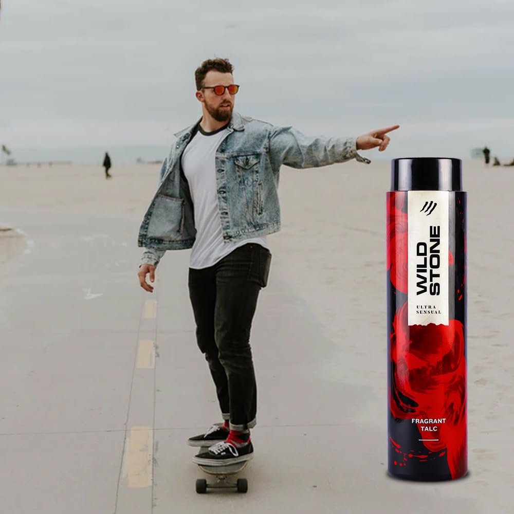 Man on a skateboard with a Wild Stone talcum powder container in the foreground