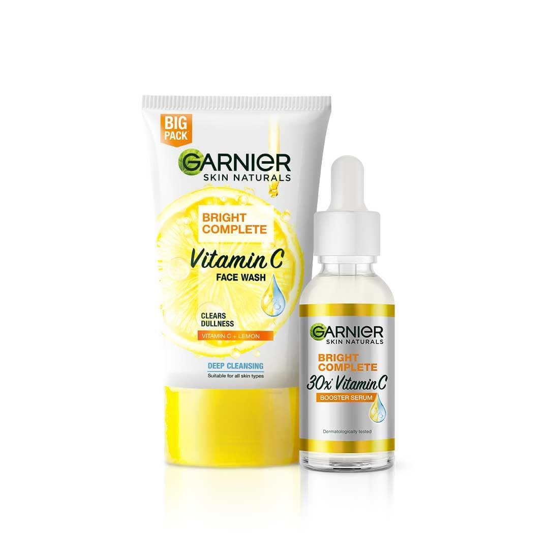 Garnier Skin Naturals Bright Complete Vitamin C face wash and booster drop on a white background
