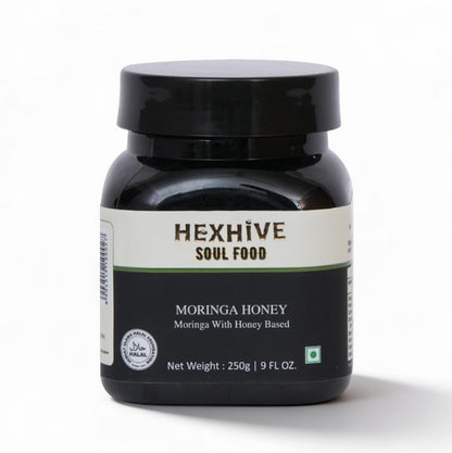 Black jar of HEXHIVE Moringa Honey on a white background
