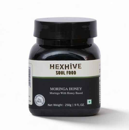 Black jar of HEXHIVE Moringa Honey on a white background