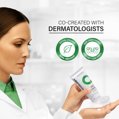 Woman holding a dermatologist-created skincare product with labels indicating hypoallergenic and non-irritant properties.