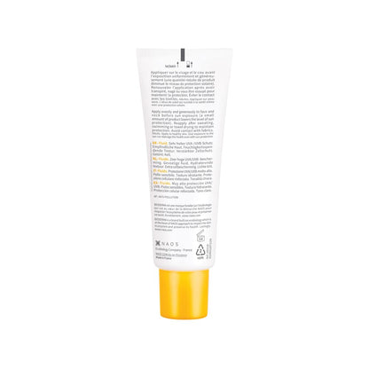 Tube of sunscreen with yellow base on a white background