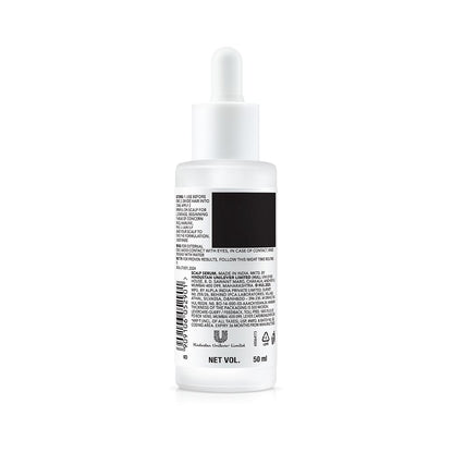Skincare serum bottle with dropper on a white background