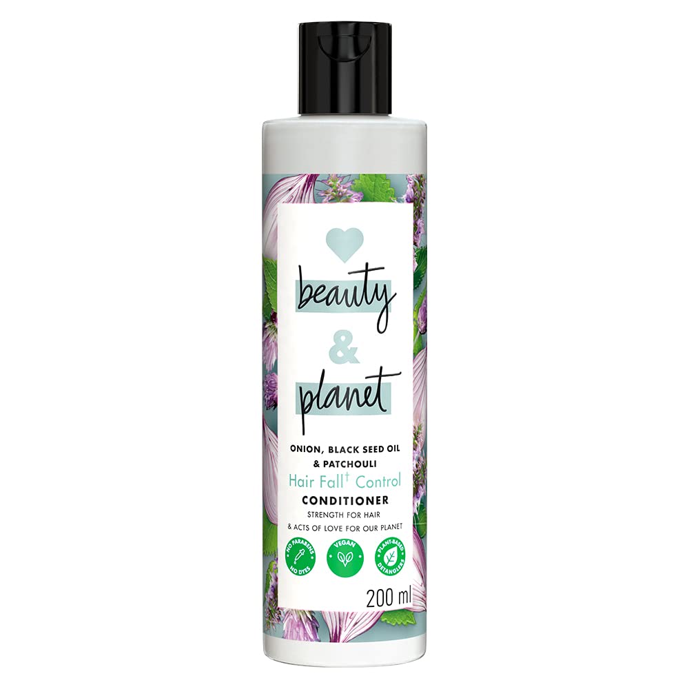 Bottle of 'beauty & planet' hair fall control conditioner on a white background