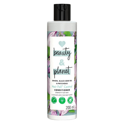 Bottle of 'beauty & planet' hair fall control conditioner on a white background